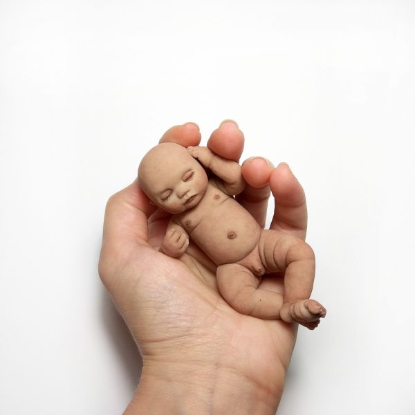 Solid silicone miniature sleeping ethnic baby boy 11,5 cm (4,6")